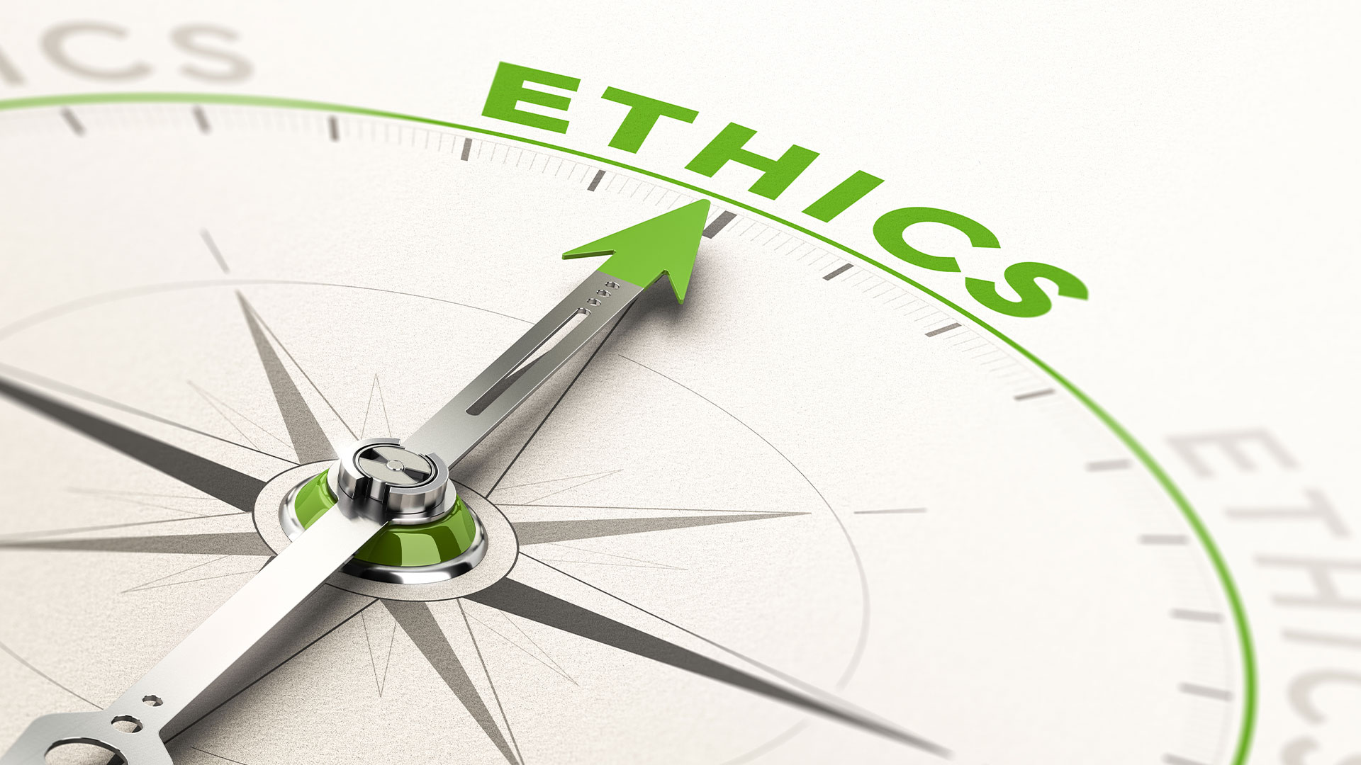 Green and white compass with needle pointing at the word "Ethics"